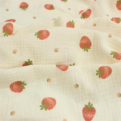 China Viable Ready To Ship New Design Good Breathable Baby Muslin Fabric Wrap Sleepwear Cotton Gauze Printed Fabric for sale