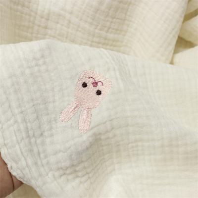 China Viable in stock new design pure cotton gauze fabric baby bear bunnies rabbit cartoon pattern double embroidery gauze fabric for sale