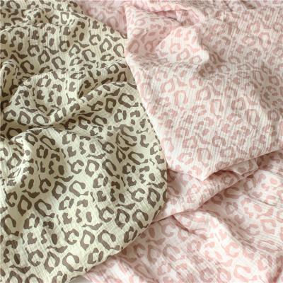 China Viable in new design running cotton baby fold fabric solid leopard print fabric for sleepwear baby clothe diaper for sale