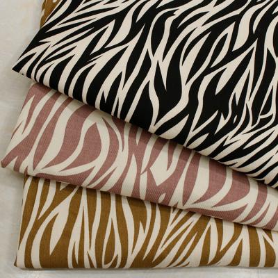 China New Design Anti Pill Zebra Print Fabric 100% Cotton Washed Woven Women Men Kids Boys Shirts Dress Cloth Zebra Cotton Cloth for sale