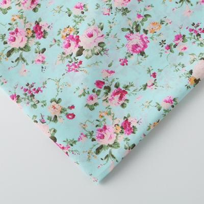 China 2022 flower design satin polyester fabric hot custom printed 100% polyester raincoats cycling for clothing for sale