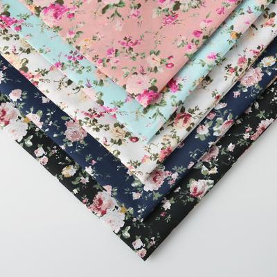 China 2021 new design waterproof customs printed yarn dyed 100% polyester flower printing cotton fabrics for bags for sale