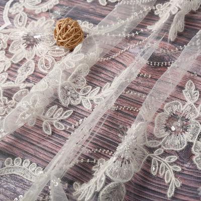 China Sustainable Millet Pearl Sequin Embroidered Lace Fabric For Wedding Dress for sale