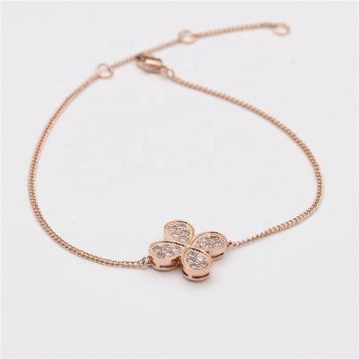 China Cute Wholesale Classic Fine Gold Plated Zircon Clover Zinc Alloy Bracelet for sale