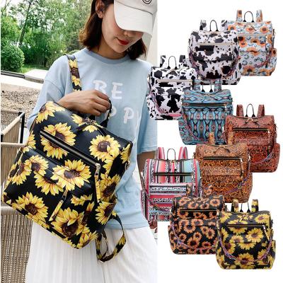 China Retro Travel Rucksack Single Shoulder British Style Portable Double Large Capacity Single Shoulder PU Print Cow Sunflower Diagonal Backpack RLB1002 for sale