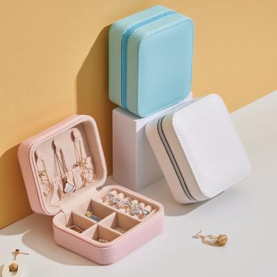 China Creative Portable Leather Mini Travel Jewelry Box Earrings Jewelry Storage Box for sale