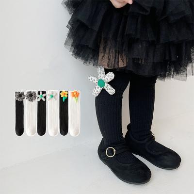 China Boutique KS0024 Breathable Wholesale White Black Knee High Sock With Big Floral For Kids Babies for sale