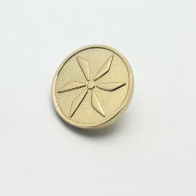 China Custom embossed logo nickel free made gold metal leg button sewing button for clothes for sale