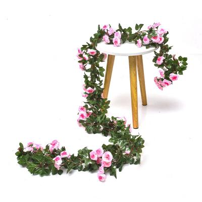 China Leaf Indoor Outdoor Ivy House Wedding Garden Decoration 33 Heads Artificial Flower Silk Garland Rose Vine Decoration New for sale