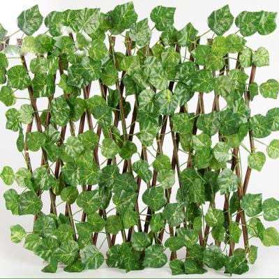 China Minimalist 0.7m Can Stretch Wholesale Green Ivy Trellis Artificial Garden Plant Fence for sale