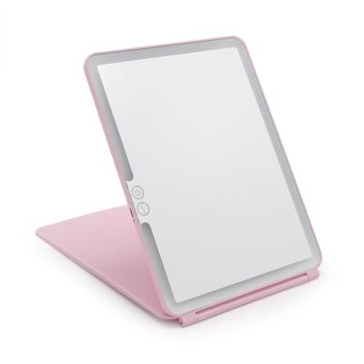 China Lighted Desk Ladies Folding Cosmetic Custom Logo Travel Makeup Mirror Portable Vanity Make Up Mirror With Led Light for sale