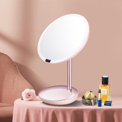 China Infrared Sensor Lighted Makeup Desk Rotatable Led Mirror With Storage Base for sale