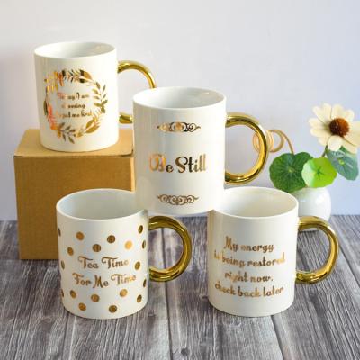 China Viable Custom Novelty Color Changing Magic Coffee Mug Ceramic Mug With Gold Handle for sale