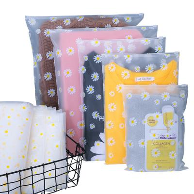 China Small Daisy Garment Zipper Bag Custom Fashion Moisture Proof Clothes Packaging Bag For Hoodies Zip Lock Pocket for sale