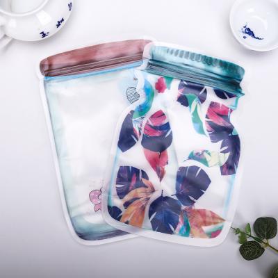 China Cute Pattern Mylar Zipper Bag Zipper Pouch Moisture Proof Lock Plastic Clear Pattern Bottle Shape Reusable Bag for sale