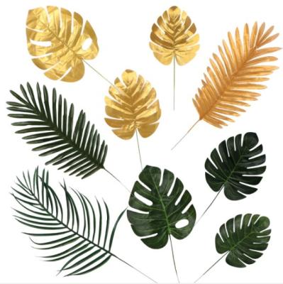 China Plastic Artificial Palm Leaves Tropical Plant Palm Leaves For Hawaiian Luau Party Jungle Beach Theme Party Table Leave Decorations for sale