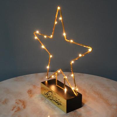 China 2021 Festival Decoration New Ramadan Decor Eid Mubarak Decoration Star With LED Lights Wooden Iron Eid Ramadan Light Islamic Table Decoration Crafts for sale