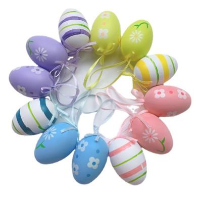 China DIY Easter Decoration Eggs 12 Pcs/Set Colorful Painted Easter Cartoon Easter Toy Egg Child Gift Easter Decoration Pendant Painted Plastic Eggs for sale