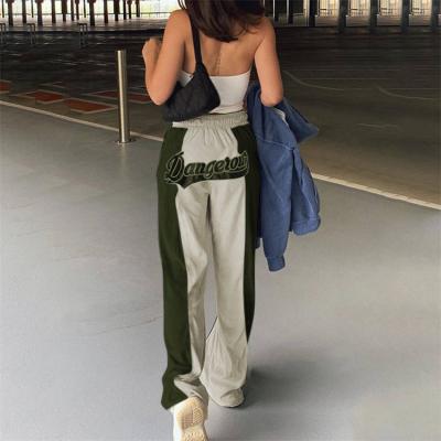 China New autumn and winter bottoms disagreement color stick breathable fabric embroider letter waist ties belt to pack buttocks recreational FX for sale