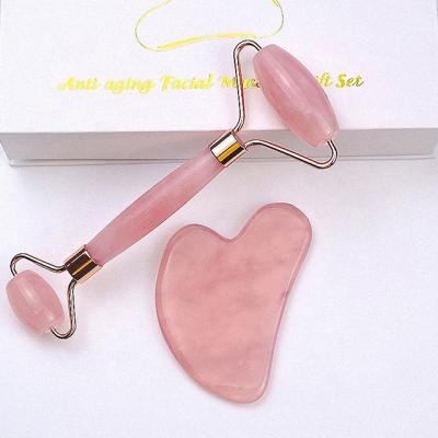 China Amazon skin rejuvenation customized skin care tools 100% natural crystal facial face rose quartz roller gua sha jade roller for sale