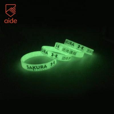 China Free Sample Customized Swimming Silicone Pride Inspirational Luminous Keepsake Bracelet Wristbands for sale