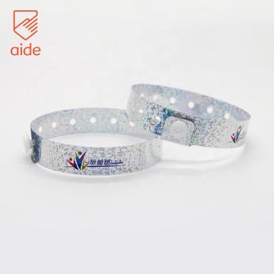 China Custom Made Custom Barcode Plastic Adjustable Glow Wristband ID Glow Promotion Gifts Holographic Wristbands for sale