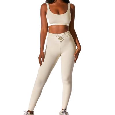 China QUICK DRY Tracksuit Women Solid Color Elastic Strap Knit Sport Logo Two Piece Pants Set Custom Fitness for sale