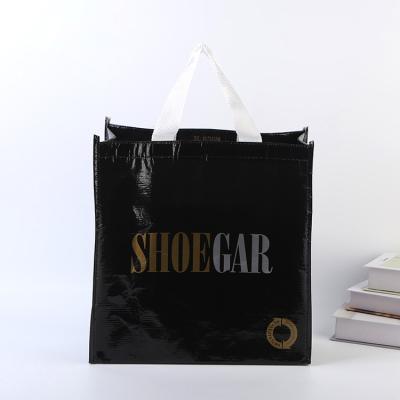 China Shopping Bag PP Woven Logo Handled Polypropylene Laminated Carry Bags For Grocery Bag for sale