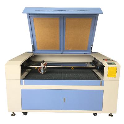 China Laser CUTTING how to reduce MDF air filter tempered glass 640 CO2 laser cutter engraving machine price for sale