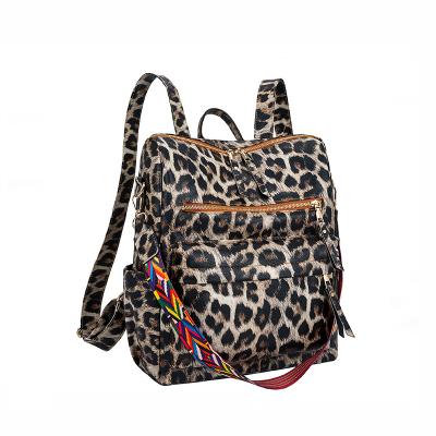 China Waterproof Animal Printed Girl's Schoolbag In Running Women's Large Capacity Waterproof Leopard Printing Leather Backpack for sale