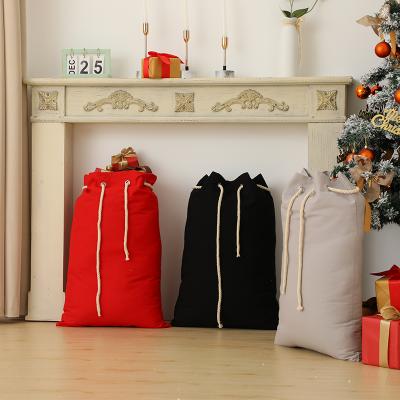 China Concise Atmospheric White Santa Sack Cotton Canvas Drawstring Christmas Empty Gift Sack for sale