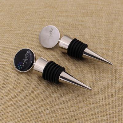 China Custom Child Safe Metal Craft White Wine Stopper With Business Logo for sale