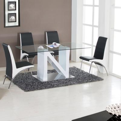 China Practical& cheap tempered glass dining table 4-6 seaters mdf with high gloss frame stainless steel base for sale