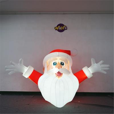 China Outdoor Promotion Christmas Decoration LED Lights Inflatable Santa For Bar Wall Decoration for sale