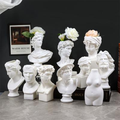 China Nordic Plastic Flowers David Garden Decor Succulents Statue Planter Vase Sculpture Home Creative Core Resin Indoor Outdoor Planter Statue for sale