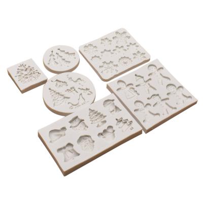 China Viable Hot Sale Christmas Series Silicone Baking Chocolate Molds Santa Claus Head Gift Box Christmas Tree Handmade Soap Mold for sale