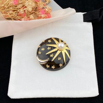 China Luxury Metal Brass Gold Plated Copper Alloy Jewelry Shape Sun Brooch With Pearl Decoration Star And Moon Brooches For Fashionable Women for sale