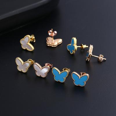 China 2022 Jewelry Luxury Sweet Blue Turquoise Soft White Butterfly Alloy Butterfly Earstuds Pearlescent Stud Earrings For Women Gifts for sale