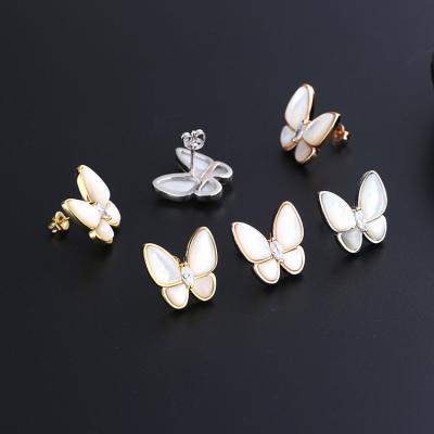 China TRENDY Two Butterfly Earrings Fashion Jewelry Cooper Alloy With Pearl Rhinestones Butterfly Stud Earrings For Women Jewelry for sale