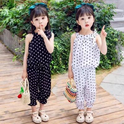 China Wholesale Yiwu Quick Dry Cheap Clothing Summer Candy Girl With Polka Dot Pattern Chiffon Sleeveless Suspender Top And Multilayer Elastic for sale