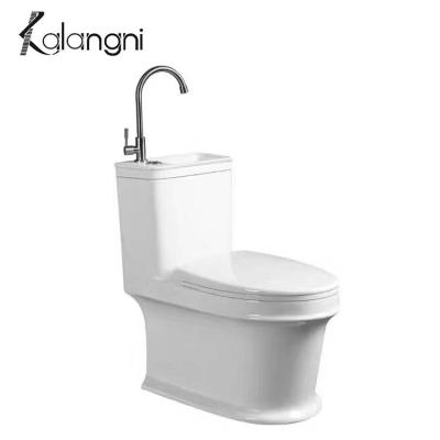 China Modern Ceramic Bathroom Bowl Double-Flow Siphonic Toiletries Soft Cover Seat Wc One Piece Public Toilet With Sink for sale