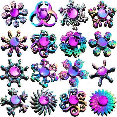 China Funny Educational Rainbow Alloy Toy Hot Sell Hand Metal Heptagonal Hand Spinner Stir Metal Spinner Finger Spinner Zinc Alloy for sale