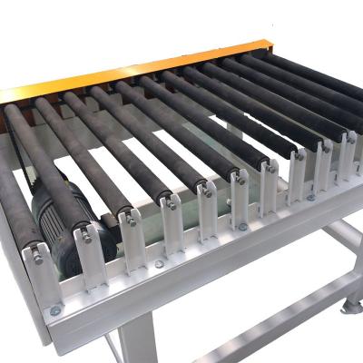 China Heat Resistant Roller Chain Pallet Conveyor Turntable Truck Loading Conveyor for sale