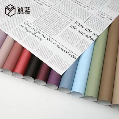 China 2022 Waterproof Wholesale Korean Gifts Wrap Paper Ink Printed Waterproof Colorful Buns Bouquet Flower Wood Pulp Wrapping Paper for sale