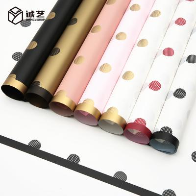 China Hot Selling Bunch Waterproof Textured Kraft Paper Wave Dot Color Edge Packaging Material Phnom Penh for sale