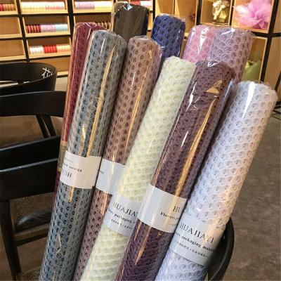 China Waterproof Professional Manufacturer Hollow Flower Packaging Holiday Mother's Day Florist Packaging Accessories Wrapping Paper for sale