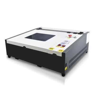 China Modern Design 4040 Full-enclosed Bottle Engraving Machine Engraving Laser Engraving Machine for sale