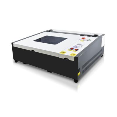 China Full-enclosed Multifunction Marble Laser Engraving Machine 4040 Laser Engraving &Cutting Machine for sale