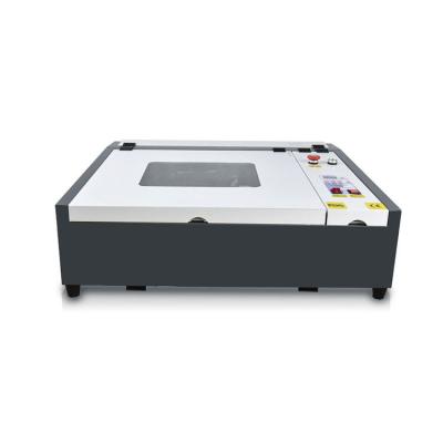 China user friendly Full-enclosed engrave machine metal granite jewelry laser engraving machine 4040 for sale