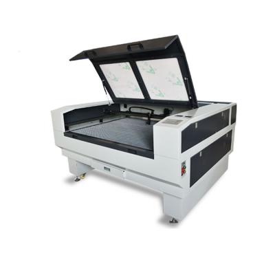 China Mini Pneumatic Engraving Machine 1390 Portable Black White Color Laser Engraving Machine Full-enclosed for sale